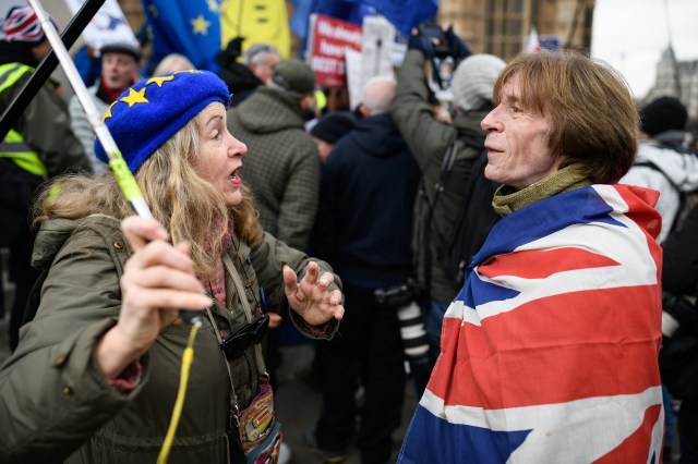 Protesters for and against the UK’s withdrawal from the EU argue over the issue at a demonstration near the Houses of Parliament in London ahead of planned votes on Brexit amendments on Jan. 29, 2019.