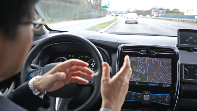 Photograph shows a prototype driverless car on demonstration around the roads of East London in 2017.