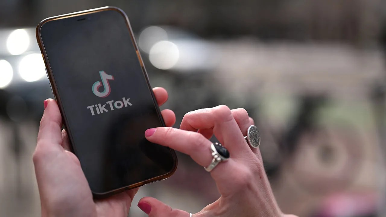 An image of someone using the TikTok app on their smartphone