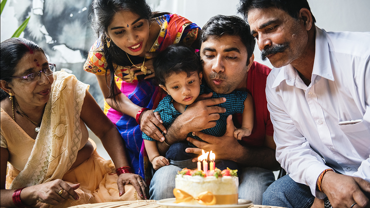 Indian family celebrating a birthday party