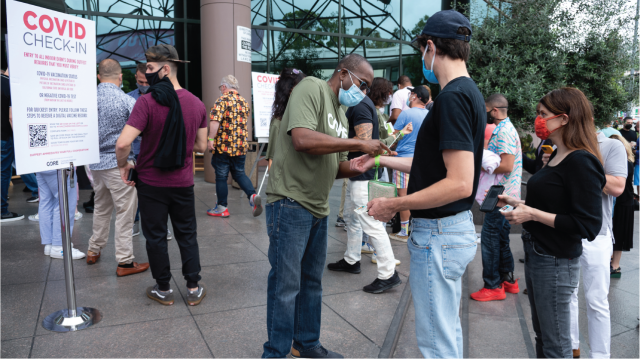 Moviegoers have their COVID-19 vaccination status checked before entering an LGBTQ film festival screening on Aug. 21, 2021, in Los Angeles. (Amanda Edwards/Getty Images)