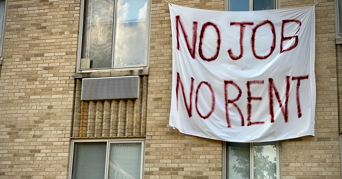 A banner against renters eviction reading no job, no rent is displayed on a controlled rent building in Washington, DC. (Eric Baradat/Getty Images)