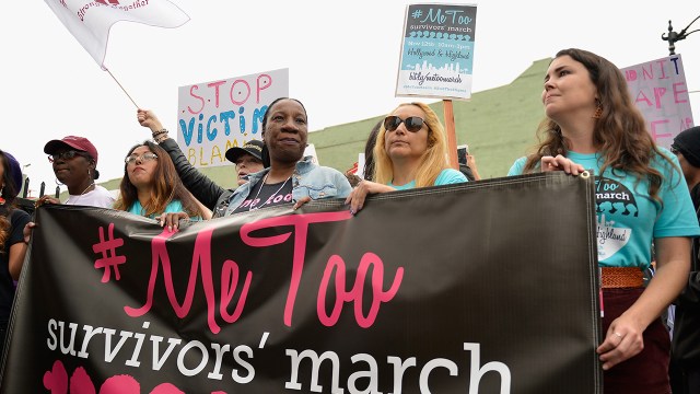 Photo showing Brenda Gutierrez, Frances Fisher and Me Too movement founder Tarana Burke hold a banner at the "#MeToo Survivors' March and Rally" on Nov. 12, 2017, in Hollywood, California. (Chelsea Guglielmino/FilmMagic)
