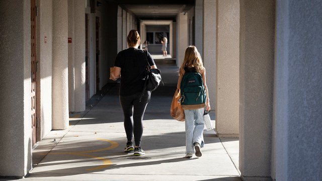 Phot showing students and parents head to class on Aug. 15, the first day of school at Melinda Heights Elementary in Rancho Santa Margarita, California. (Paul Bersebach/MediaNews Group/Orange County Register via Getty Images)