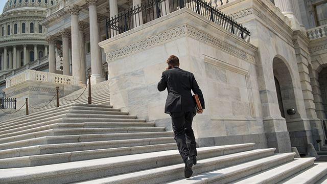 Sen. Ben Sasse, R-Neb., ascends the Capitol steps shortly before the Senate began its recess on Aug. 3, 2017. (Tom Williams/CQ Roll Call)