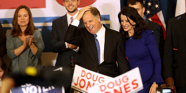 Democratic U.S. Sen.-elect Doug Jones greets supporters during his election night gathering at the Sheraton Hotel on Dec. 12, 2017, in Birmingham, Alabama. Jones defeated Republican challenger Roy Moore in a special election to claim Alabama's Senate seat that was vacated by Attorney General Jeff Sessions. (Justin Sullivan/Getty Images)