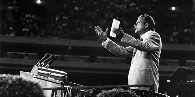 The Rev. Billy Graham preaching in 1955. (Keystone/Getty Images)