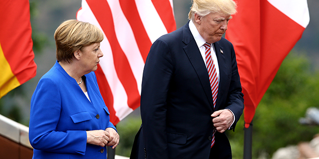 German Chancellor Angela Merkel with U.S. President Donald Trump in Taormina, Italy, on May 2017. (Photo by Matteo Ciambelli/NurPhoto via Getty Images)