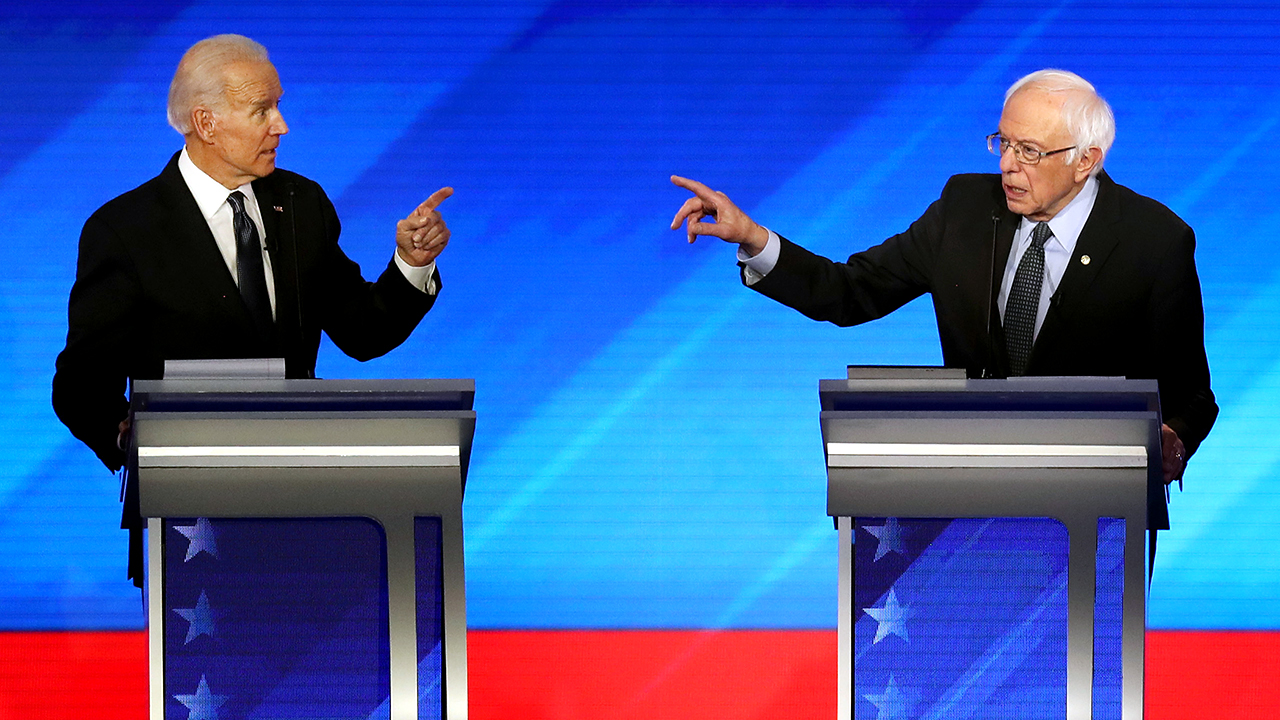 Democratic voters see big ideological differences between candidates Joe Biden and Bernie Sanders, seen here at the Feb. 7 Democratic presidential primary debate at St. Anselm College in Manchester, New Hampshire. (Joe Raedle/Getty Images)