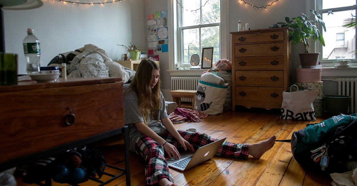 A sophomore at Brooklyn Friends School checks into her classes remotely from home after the school announced that it will be closed due to concerns about the coronavirus in Brooklyn, New York. (Andrew Lichtenstein/Corbis via Getty Images)
