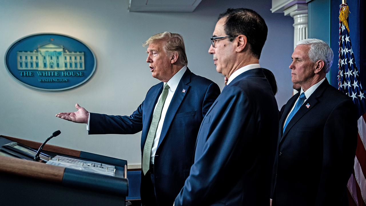 President Donald Trump, Treasury Secretary Steven Mnuchin and Vice President Mike Pence speak at a White House press briefing about U.S. response to the COVID-19 pandemic. (Jabin Botsford/The Washington Post via Getty Images)