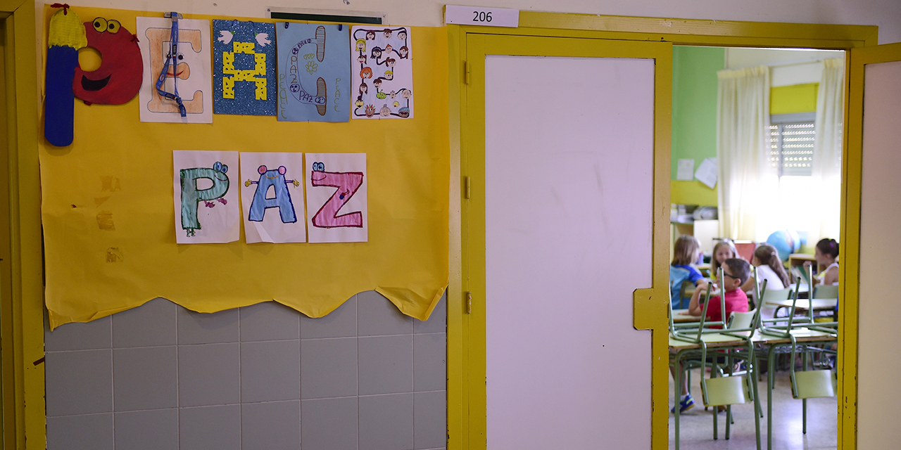 A sign reading "peace" in English and Spanish at the Doctor Tolosa Latour public school in Madrid. Pierre-Philippe Marcou/AFP via Getty Images)