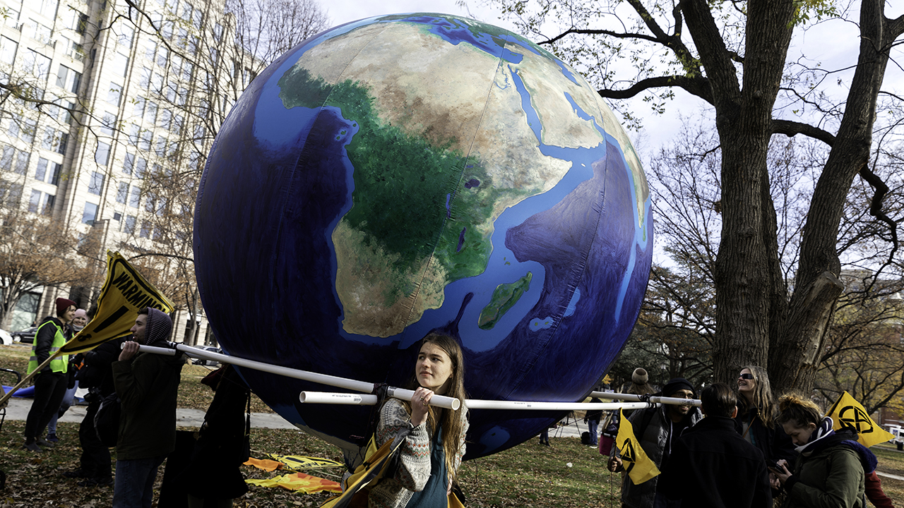 Activists gather to participate in a climate change protest in Washington, D.C., on Friday, Dec. 6, 2019. (Aurora Samperio/NurPhoto via Getty Images)