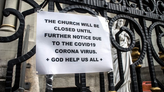 Sign on a church in New York City in March. (Bill Tompkins via Getty Images)