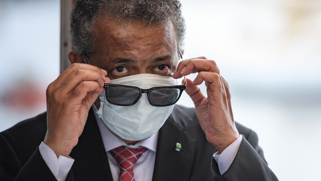 World Health Organization Director-General Tedros Adhanom Ghebreyesus leaves a ceremony in Geneva for the restarting of the city's Jet d'Eau fountain in June 2020. The fountain had been shut off due to concerns over the coronavirus outbreak. (Fabrice Coffrini/AFP via Getty Images)