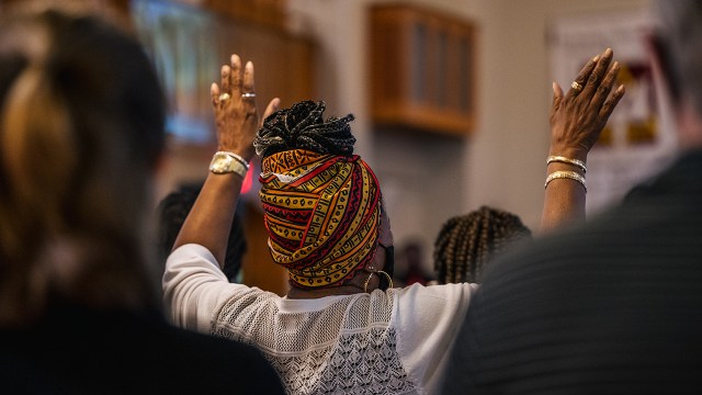 Worshippers attend a service at First Baptist Church North Tulsa on May 30, 2021, in Tulsa, Oklahoma, to commemorate the 100th anniversary of the Tulsa Race Massacre.