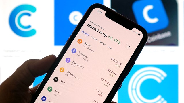A smartphone app shows cryptocurrency exchange rates in April.