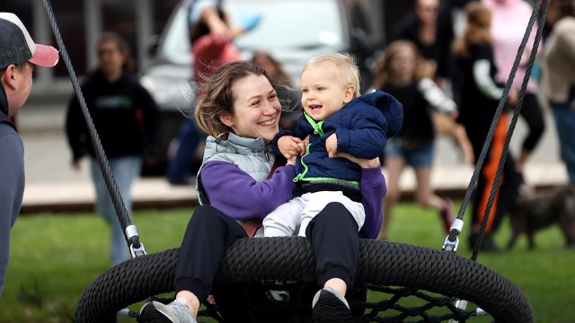 A family gets back to the playground on Oct. 6, 2021, in Auckland, New Zealand.