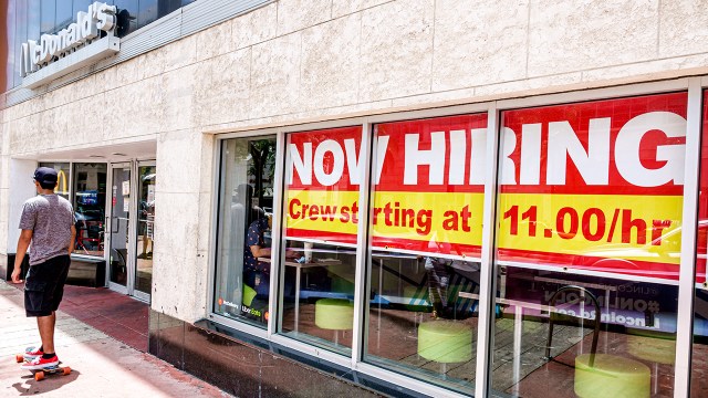 A fast-food restaurant displays a hiring sign in Miami Beach, Florida.