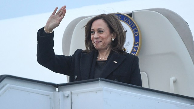 U.S. Vice President Kamala Harris waves as she boards Air Force Two on March 11, 2022, in Otopeni, Romania.