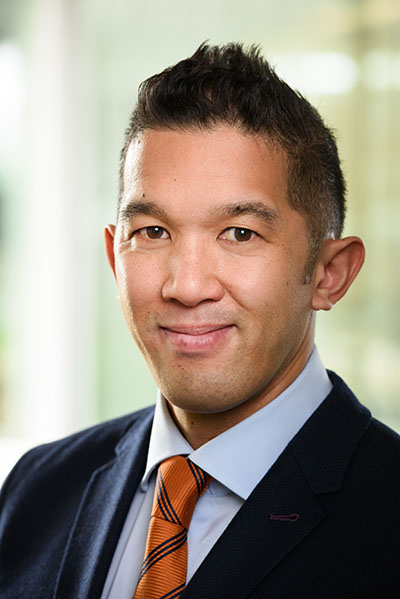 A headshot of Neil Ruiz, associate director of race and ethnicity research 