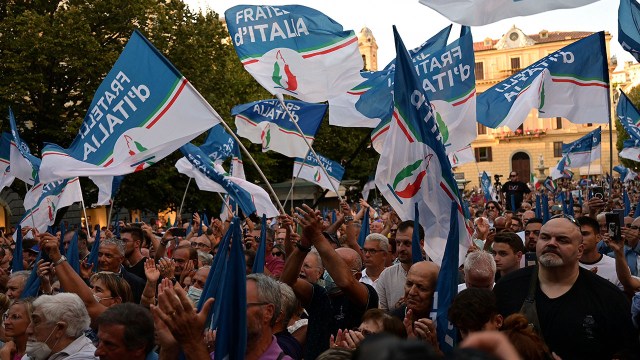 Party supporters attend a campaign launch rally for the leader of the Italian far-right party Brothers of Italy, Giorgia Meloni, in central Italy on Aug. 23, 2022. Meloni has been critical of Russia's military invasion of Ukraine.