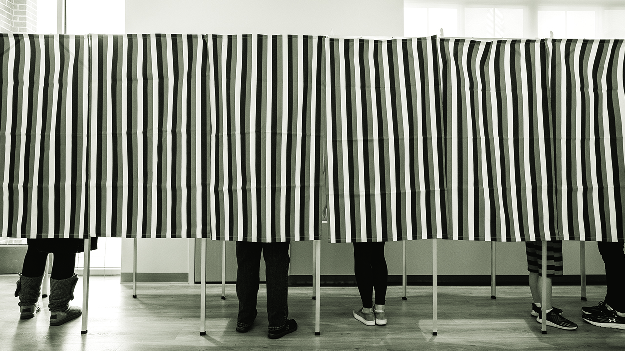 Voters fill in their ballots at polling booths in Concord, New Hampshire, on Nov. 3, 2020. Joseph Prezioso/AFP via Getty Images