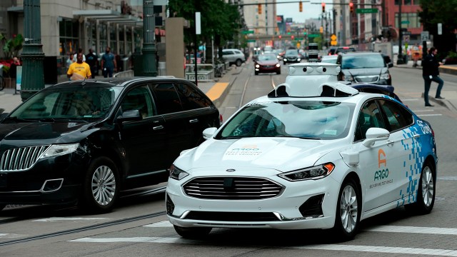 A Ford Argo AI test vehicle drives through downtown Detroit in July 2019. (Jeff Kowalsky/AFP via Getty Images)