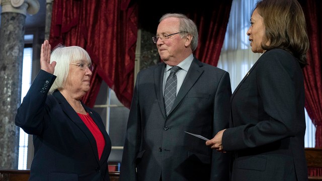 Sen. Patty Murray, D-Wash., is ceremonially sworn in by Vice President Kamala Harris in the Old Senate Chamber on Capitol Hill in Washington on Jan. 3, 2023, as Murray's husband, Rob Murray, looks on. She is the first woman to be Senate president pro tempore.