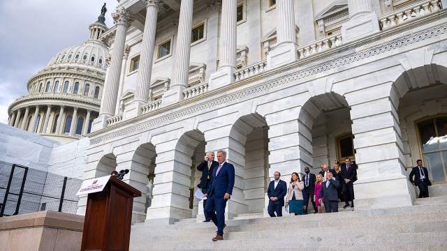 House Speaker Kevin McCarthy and others arrive at a rally marking the 100th day of Republican control of the House of Representatives at the U.S. Capitol on April 17, 2023. (Nathan Posner/Anadolu Agency via Getty Images)