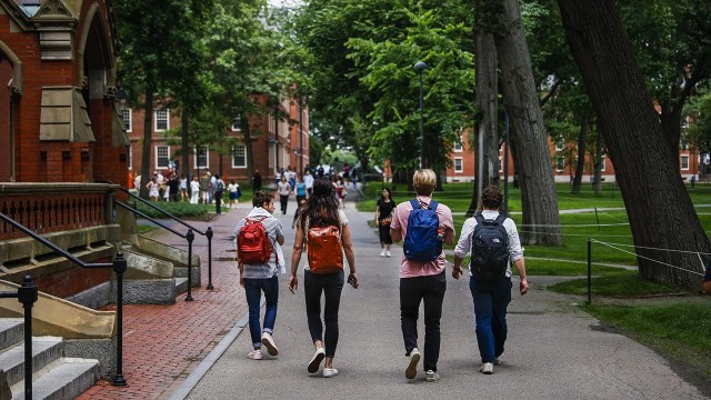 Students walk through the Harvard University campus in Cambridge, Massachusetts. The school's race-conscious admissions program was recently at the center of a U.S. Supreme Court case. (Erin Clark/The Boston Globe via Getty Images)