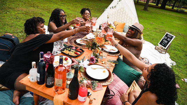 Friends enjoy a birthday picnic in East Meadow, New York. (Steve Pfost/Newsday RM via Getty Images)