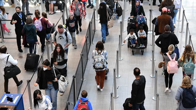 Travelers line up for TSA screening at Orlando International Airport in Florida in December 2022. (Paul Hennessy/Anadolu Agency via Getty Images)