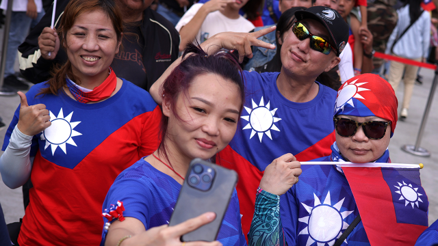 Local residents participate in a Taiwan National Day parade on Oct. 10, 2023, in New Taipei City. (Alex Wong/Getty Images)
