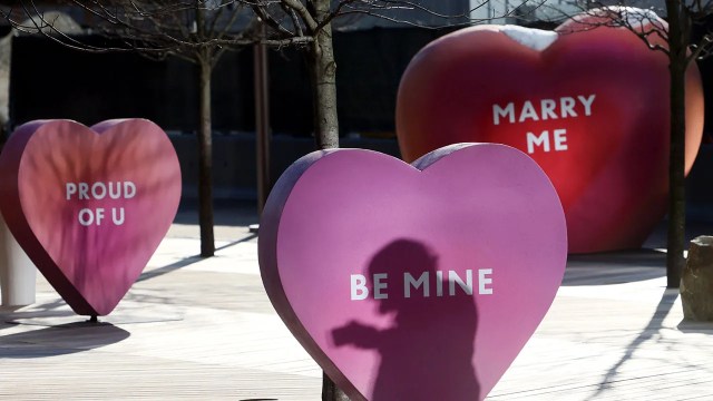 Valentine's Day-themed conversation hearts are featured in an art installation in Seaport, Boston, in 2022. (Jessica Rinaldi/The Boston Globe via Getty Images)