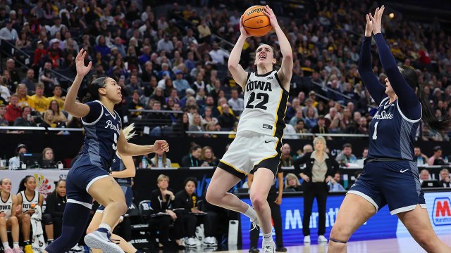 Caitlin Clark of the Iowa Hawkeyes shoots over Penn State's defense at the Big Ten Tournament quarterfinals on March 8, 2024, in Minneapolis, Minnesota. (Adam Bettcher/Getty Images)