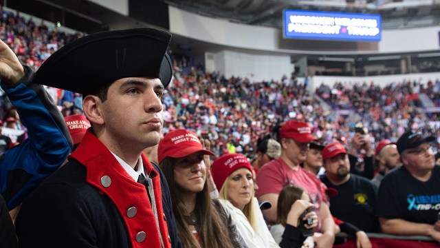 Supporters listen as the US president speaks during a Make America Great Again rally in Green Bay, Wisconsin, April 27, 2019. (Photo by SAUL LOEB / AFP) (Photo credit should read SAUL LOEB/AFP/Getty Images)