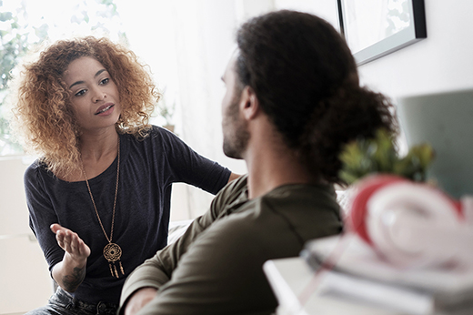 Young couple arguing at home