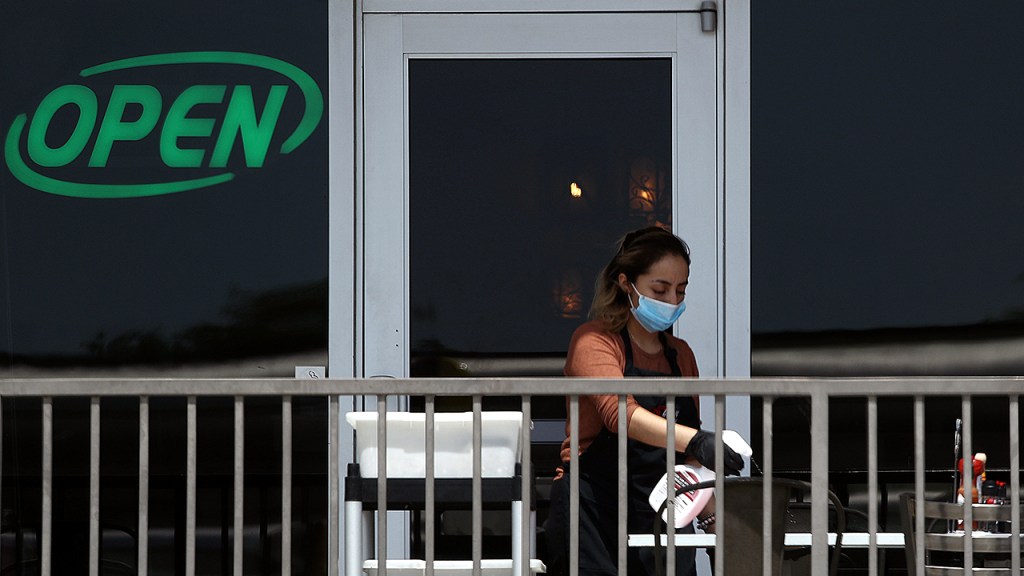 Americans remain concerned that states will lift restrictions too quickly, but partisan differences widen