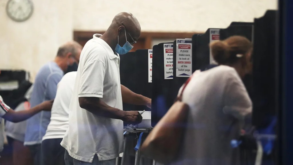 Voters cast their early ballots at the Coral Gables Branch Library precinct on Oct. 19, 2020, in Coral Gables, Florida. (Joe Raedle/Getty Images)