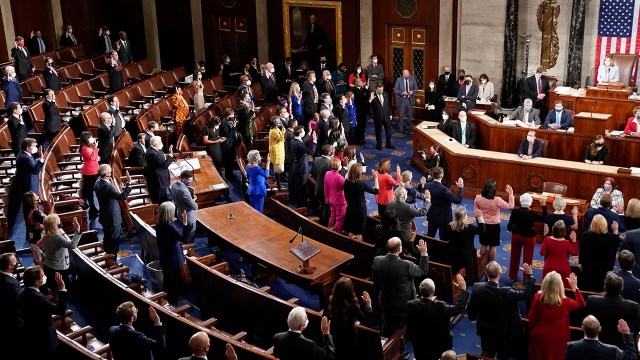 Democratic members of the U.S. House of Representatives are sworn in by Speaker Nancy Pelosi during the first session of the 117th Congress on Jan. 3, 2021. (Erin Scott/POOL/AFP via Getty Images)