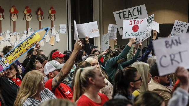 Proponents and opponents of teaching critical race theory attend a school board meeting in Yorba Linda, California, in November 2021. (Robert Gauthier/Los Angeles Times via Getty Images)