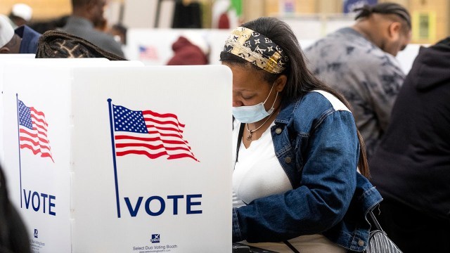 A voter casts a ballot at a polling station in Detroit on Election Day 2022. (Matthew Hatcher/SOPA Images/LightRocket via Getty Images)