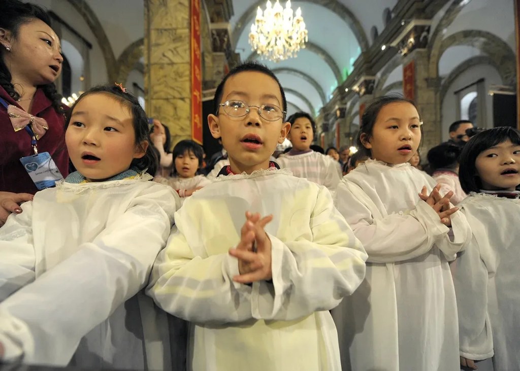 Chinese children attend a Holy Communion