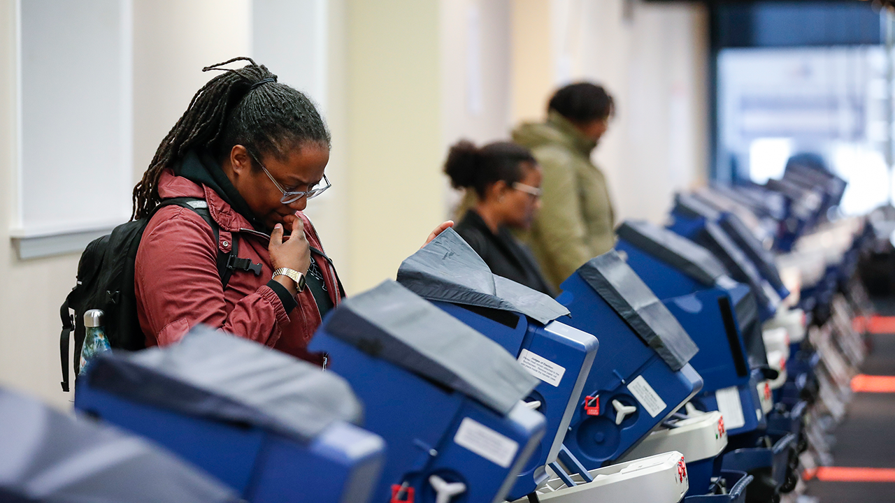 An image of Voters casting their ballots at a polling place in downtown Chicago on April 2, 2019. (Photo by Kamil Krzaczynski/AFP via Getty Images)