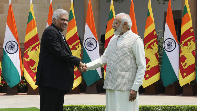 Indian Prime Minister Narendra Modi, right, shakes hands with Sri Lankan President Ranil Wickremesinghe before a meeting in New Delhi in July 2023. (Naveen Sharma/SOPA Images/LightRocket via Getty Images)