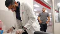 Pharmacist Deep Patel prepares flu and COVID-19 vaccines for a customer in Huntington Park, California, on Aug. 28, 2024. (Christina House/Los Angeles Times via Getty Images)