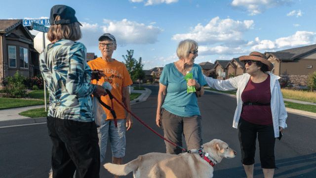 Neighbors chat in Broomfield, Colorado, in September 2022. (Melina Mara/The Washington Post via Getty Images)