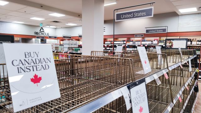 Signs on empty shelves normally featuring American goods at a supermarket in Vancouver, Canada, on March 28. (VCG/VCG via Getty Images)