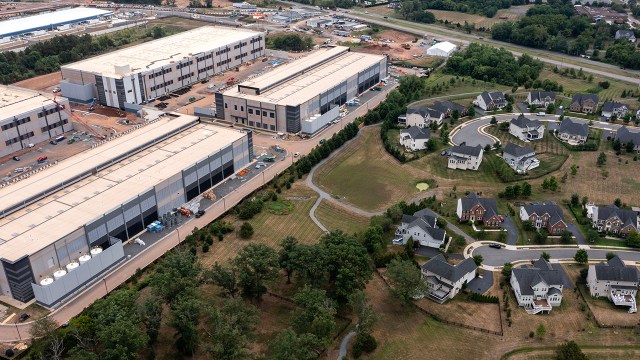 An Amazon Web Services data center is shown near a neighborhood in Stone Ridge, Virginia, in 2024. Northern Virginia is the top data center market in the U.S. (Nathan Howard/Getty Images)
